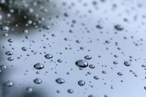 Raindrops on the surface of the car glass. Raindrops natural abstract background. 3 photo