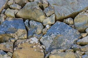 Texture of a stone wall. Stone wall as a background or texture.1 photo