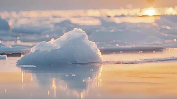 A lone melting iceberg in the midst of a sea ice melt pond slowly shrinking in the summer sun video