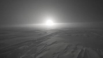 A faint glimmer of light reflected off the snow the only sign of life during the seemingly endless Polar Night video