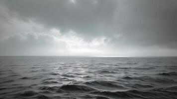 A panoramic view of a calm ocean meeting dark and stormy skies a result of an atmospheric rivers influence video