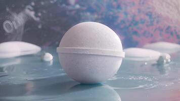 Enchanting scents of vanilla and jasmine fill the air as a bath bomb slowly dissolves in a deep relaxing bath video