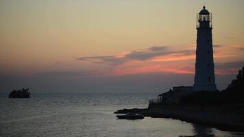 Amazing colourful time lapse sunset at ocean near old Lighthouse and sunken ship video