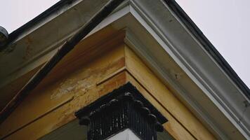 Building residence facade in classical style of architecture. Stock footage. Low angle view of old facade of a building with columns. video