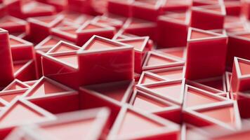 looping animazione di un' gruppo di rosso plastica triangolare geometrico forme. video