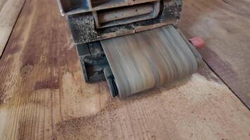 Floor sanding, grinder with grinding wheel, electric grinder, floor cleaning of old paints, repair, renovation. video