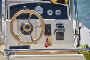 The boat's steering console photo