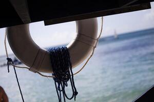 Life buoy at the sea photo