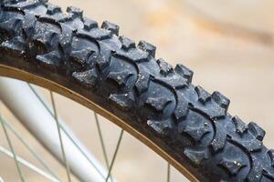 Closeup view of a dirty bicycle tyre photo