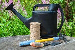 garden tools watering can, scoop, thread photo