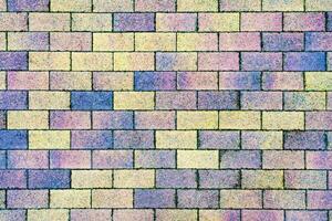 Multicolor stone tile as brickwork as background, texture, abstract photo