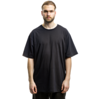 une Jeune homme des stands portant une plaine noir T-shirt, posant pour une transparent Contexte png