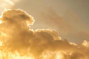 Dramatic view of a orange sunset clouds as background, copy space photo