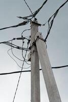 Top of a concrete power line support photo