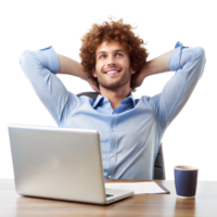 A smiling man with curly hair leans back in his chair, hands behind head, next to a laptop and coffee cup png