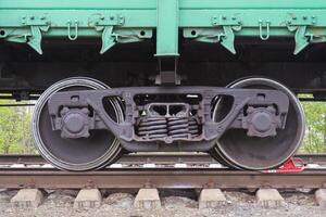 The wheels of a railcar photo