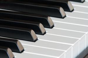 Piano keys side view close-up photo