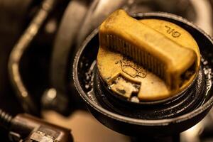 Dirty Oil Cap Car Engine Detail photo