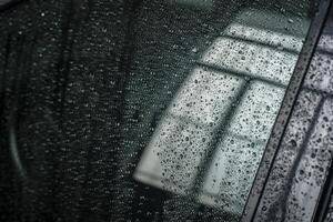Detail of water droplets on the car window 3 photo