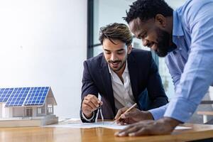 Team of architecture and businessman is discussing and brainstorming over floor plan modification for real estate investment and housing development project photo