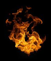Fire and burning flame of explosive fireball isolated on dark background for abstract graphic design photo