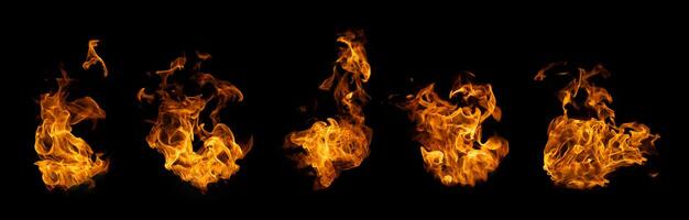 The set of fire and burning flame isolated on dark background for graphic design photo