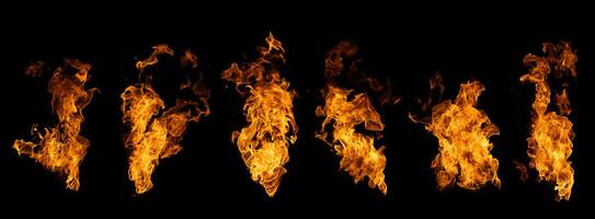 The set of fire and burning flame isolated on dark background for graphic design photo