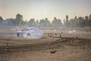 Villamarzana 10 September 2023 Intense car race capturing the thrill of drifting on a challenging circuit photo