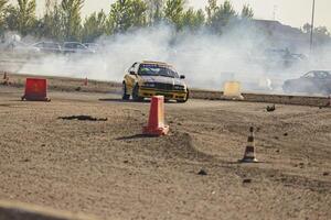 Villamarzana 10 September 2023 Intense car race capturing the thrill of drifting on a challenging circuit photo