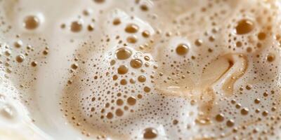 Close up abstract brown caramel shapes latte art in coffee. Liquid texture coffee background macro. Cappuccino and milk foam close up view. High quality photo