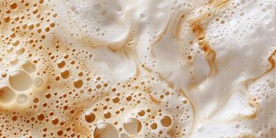 Close up abstract brown caramel shapes latte art in coffee. Liquid texture coffee background macro. Cappuccino and milk foam close up view. High quality photo