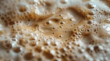 Close up abstract brown caramel shapes latte art in coffee. Liquid texture coffee background macro. Cappuccino and milk foam close up view. High quality photo
