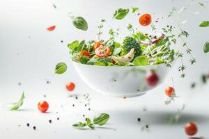 Flying vegetable salad ingredients over transparent and white bowl. Vitamins and healthy eating concept. High quality photo