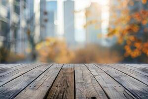 Wooden tabletop with a blurred backdrop of office buildings in a business district during fall photo