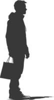 Silhouette man with Shopping bag full body black color only vector