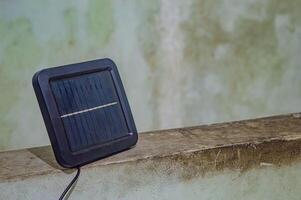 mini portable solar panels for environmentally friendly renewable energy electricity with copy space photo