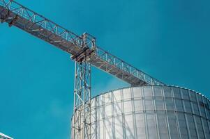 several giant silos in a flour mill photo