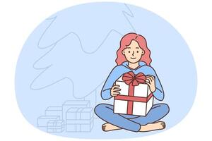 Happy girl with Christmas gifts near fir tree vector