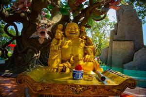 A Guardian statue at Suoi Tien park in Ho Chi Minh Vietnam photo