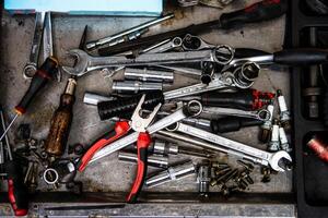 Garage. Car repair. Tools. Rubber tires, wheels. photo