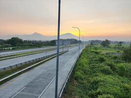 Beautiful sunset view on toll road in Boyolali, Indonesia photo