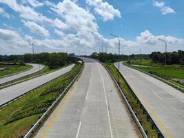 high angle view of the toll road with surrounding natural views in Boyolali, Indonesia photo