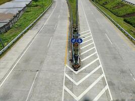 High angle view of traffic signs for direction on the toll road in Boyolali Indonesia photo