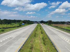 high angle view of the toll road with surrounding natural views in Boyolali, Indonesia photo