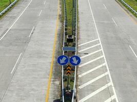 High angle view of traffic signs for direction on the toll road in Boyolali Indonesia photo