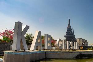 a monument and border gate between the city of Surabaya and Gresik Regency with the signature or name of Gresik Regency, Indonesia, 16 May 2024. photo