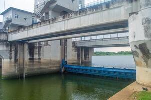 a dam on the Bengawan Solo River in the afternoon to control flood water photo