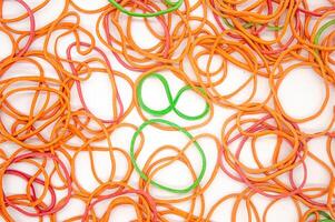 a bunch of messy rubber bands on a white background photo