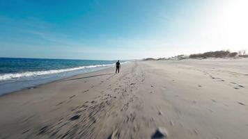 Man Ending His Run In Front Of The Ocean video