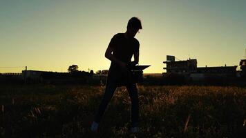 silhouette of filmmaker in action video